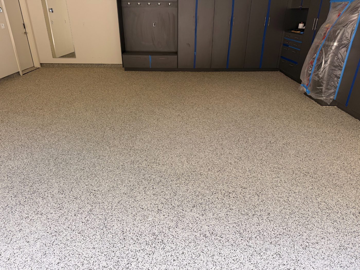 Decorative flake broadcast on garage floor