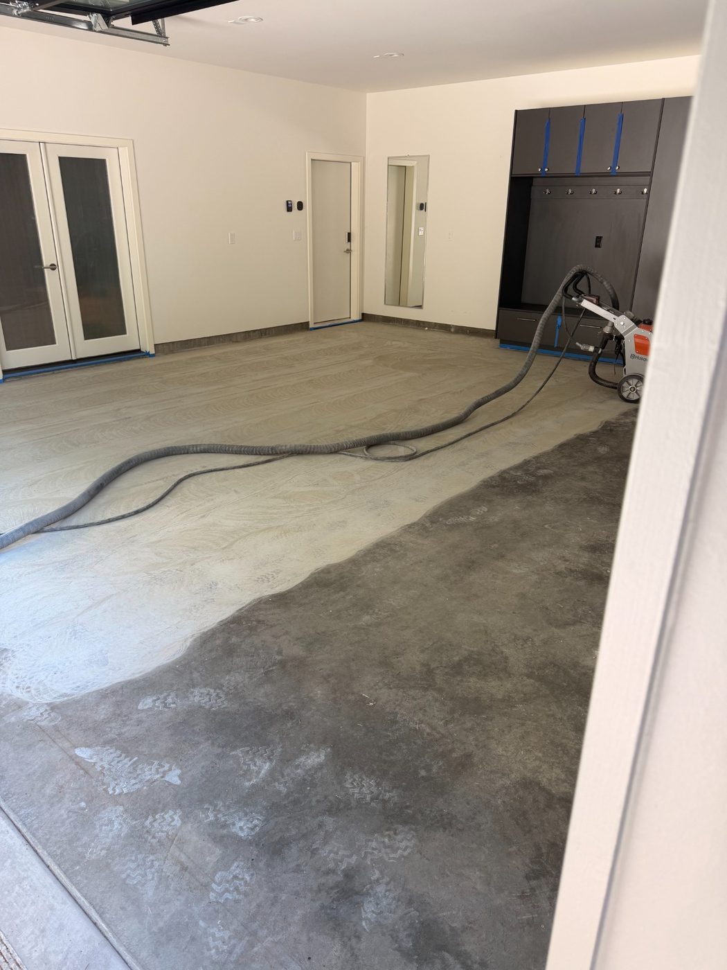 Wide view of mechanically prepared garage floor